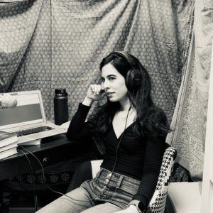 Roxanne Khamsi in an audio recording booth